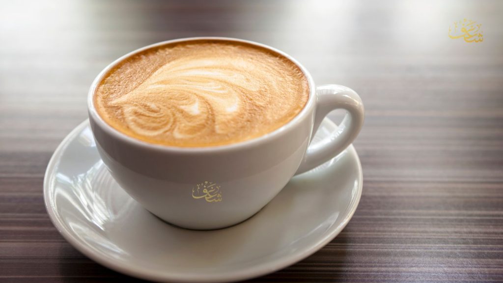 Smooth Flat White coffee in a ceramic cup at Shaghf VA Café