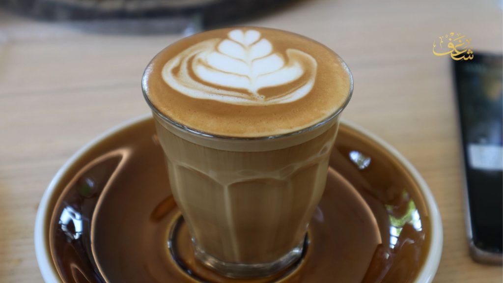 Close-up of the best piccolo in Alexandria VA, featuring a perfectly balanced ristretto shot with velvety steamed milk, expert barista preparation, and a cozy café atmosphere for coffee lovers.