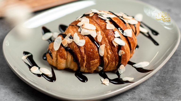 Best almond croissant near me in Manassas by ShaghfVA Cafe with flaky buttery layers and sweet almond filling.