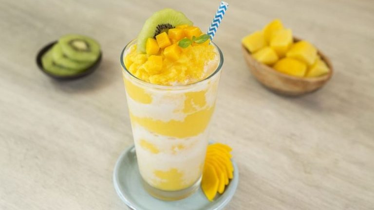 Best mango frappe near me in Manassas with creamy blended ice, fresh mango flavor, and topped with whipped cream.